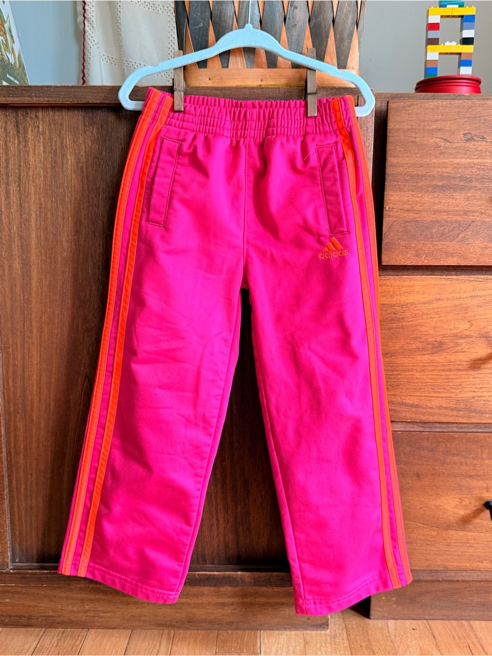 adidas Kids Bright Pink Lined Joggers with Orange Side Stripes